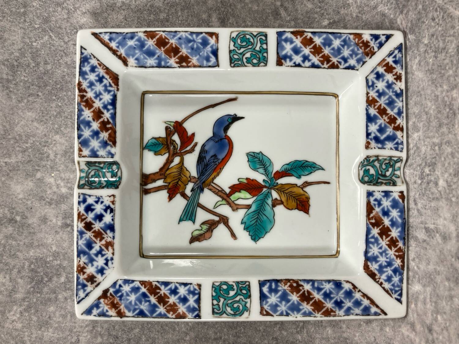 Ashtray. Trinket dish. Japanese porcelain. Blue bird on an autumn branch