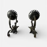 Vintage wrought iron wall lights in rustic gothic style.