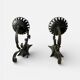 Vintage wrought iron wall lights in rustic gothic style.