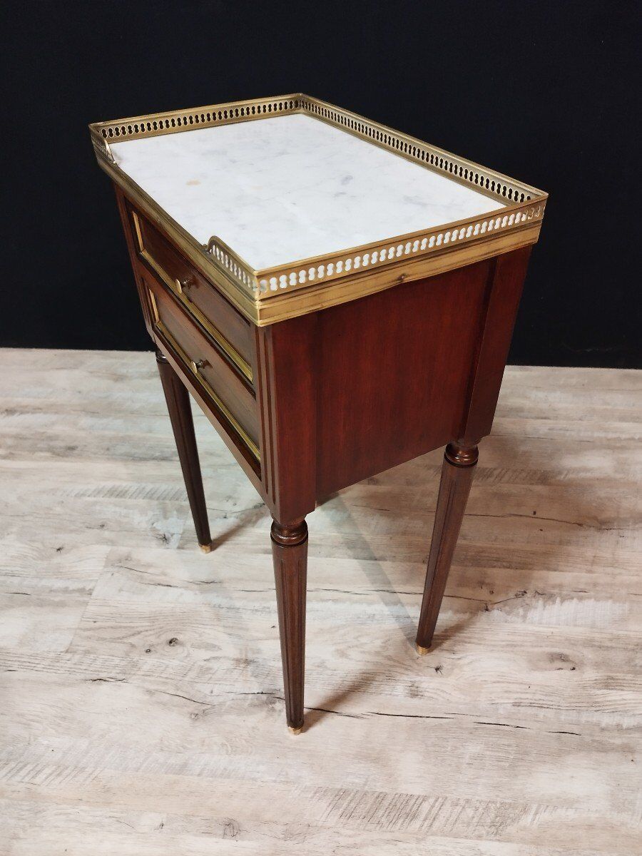 Pair of Louis XVI style bedside tables in mahogany
