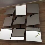 Scandinavian mirror has 9 removable panels by Markus Borgen