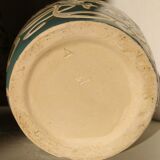 Blue water vase with white floral pattern