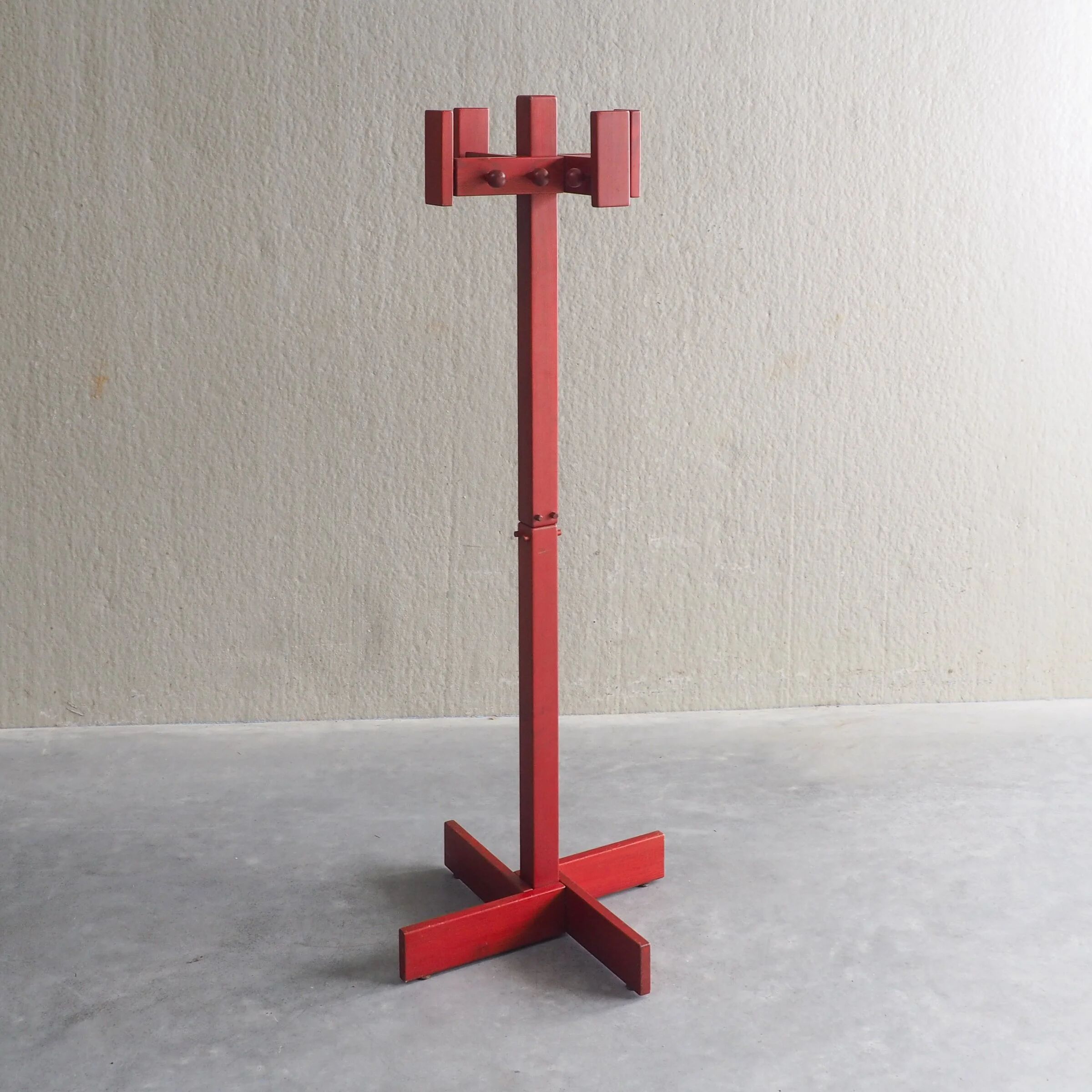Postmodern red stained pine wood coat hanger