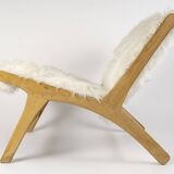 Pair of low chairs by olivier de schrijver