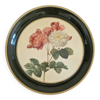 Metal plate with floral decoration