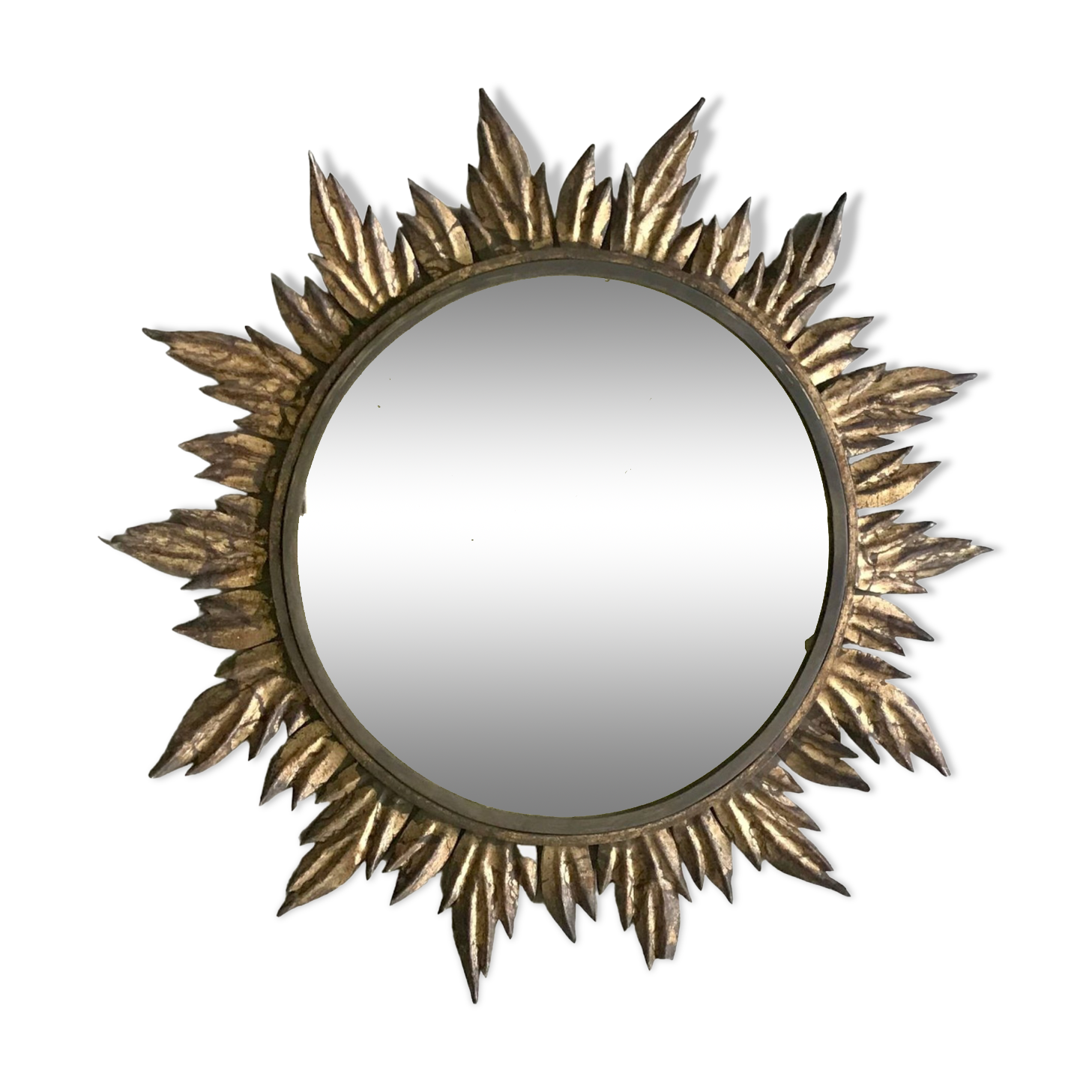 Sun mirror decorated with golden leaves, circa 1950.