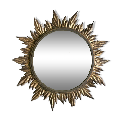 Miroir soleil à décor de feuilles dorées, vers 1950.
