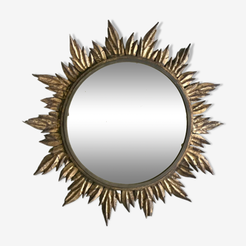 Sun mirror decorated with golden leaves, circa 1950.