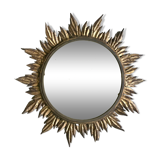 Sun mirror decorated with golden leaves, circa 1950.