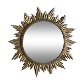 Sun mirror decorated with golden leaves, circa 1950.