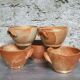 Set of 5 large sandstone bowls signed