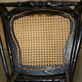 Four antique Regency bergère chairs with mother-of-pearl inlay.