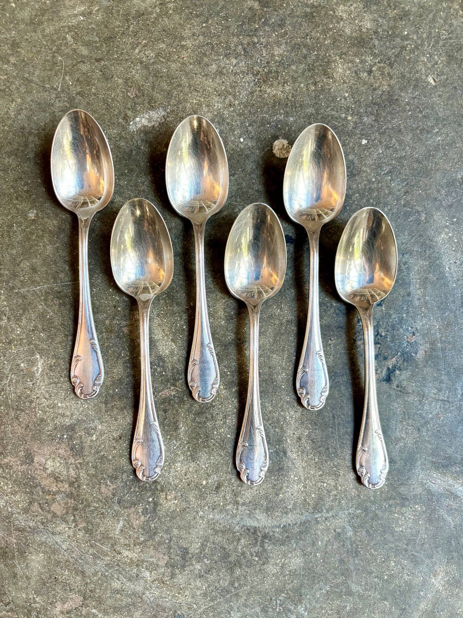 6 small silver metal spoons
