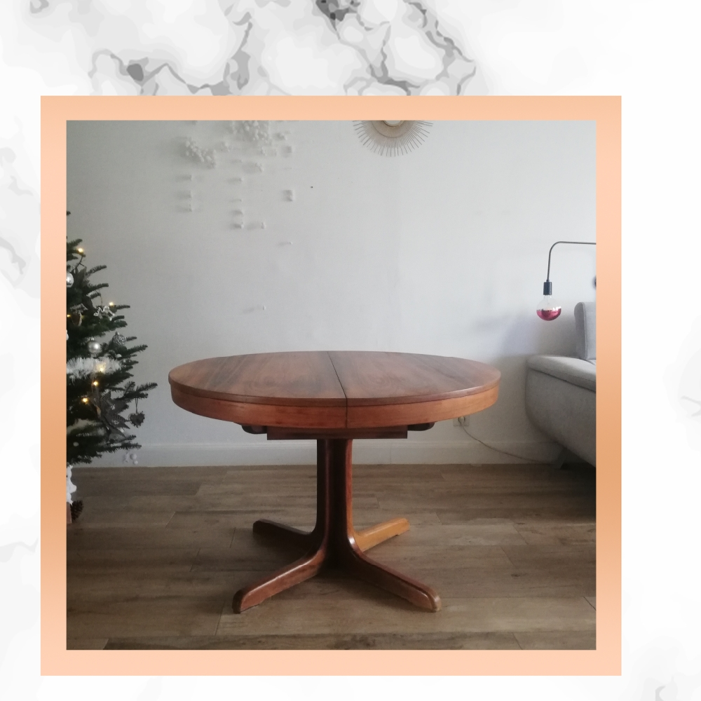 Extendable rosewood butterfly round table