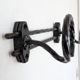 Wrought iron wall coat rack