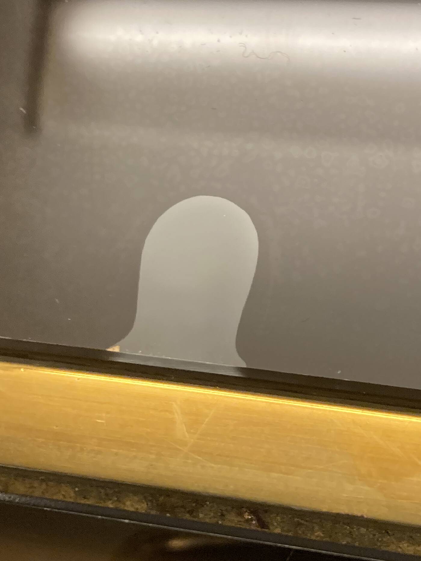 Coffee table in solid brass and black opaline. 1970