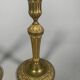 Paire de bougeoirs  Louis XVI En Bronze Ciselé Et Doré.