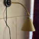 Vintage adjustable wall light – yellow metal and brass – 1960s