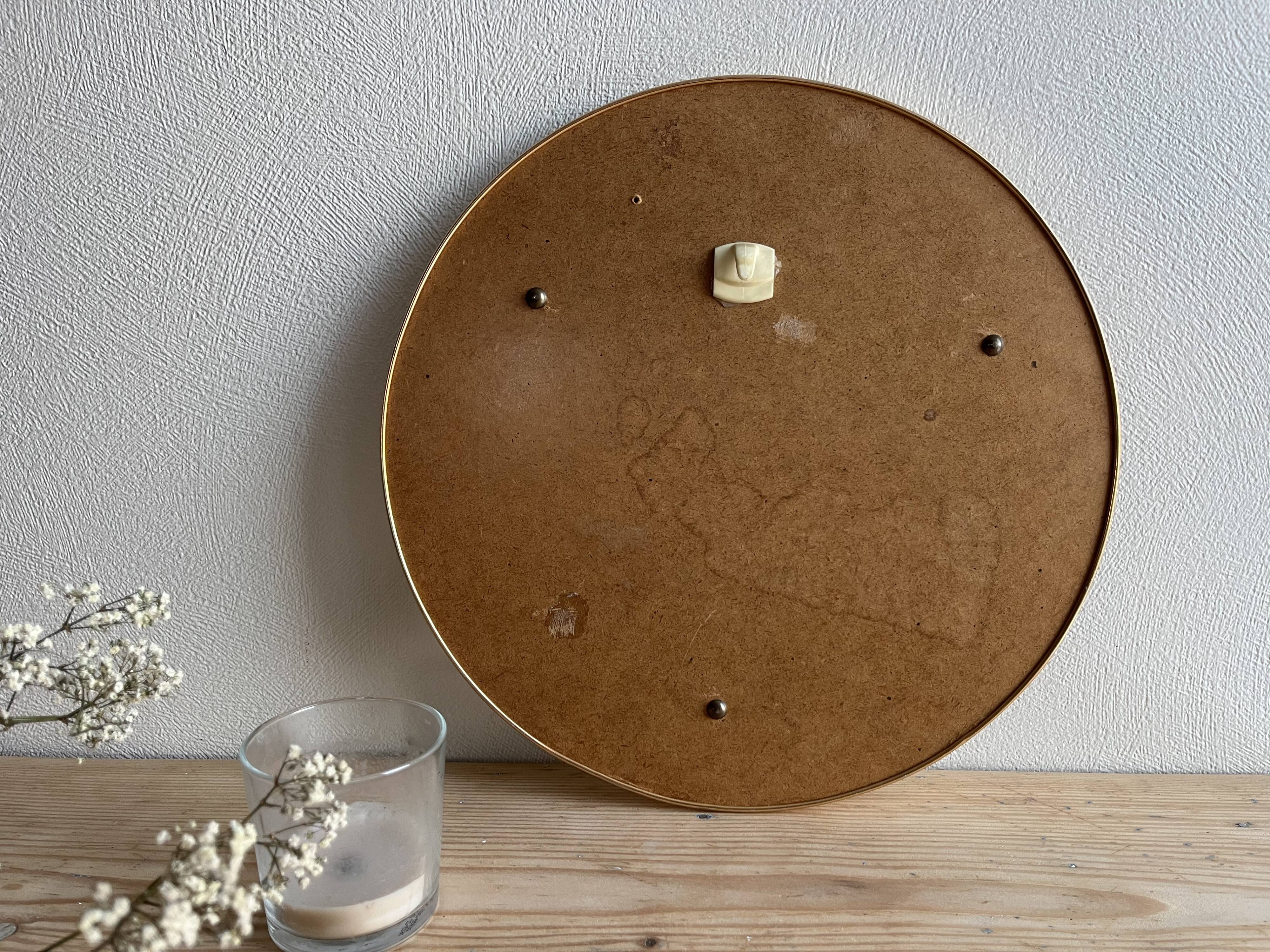 Vintage round gold mirror