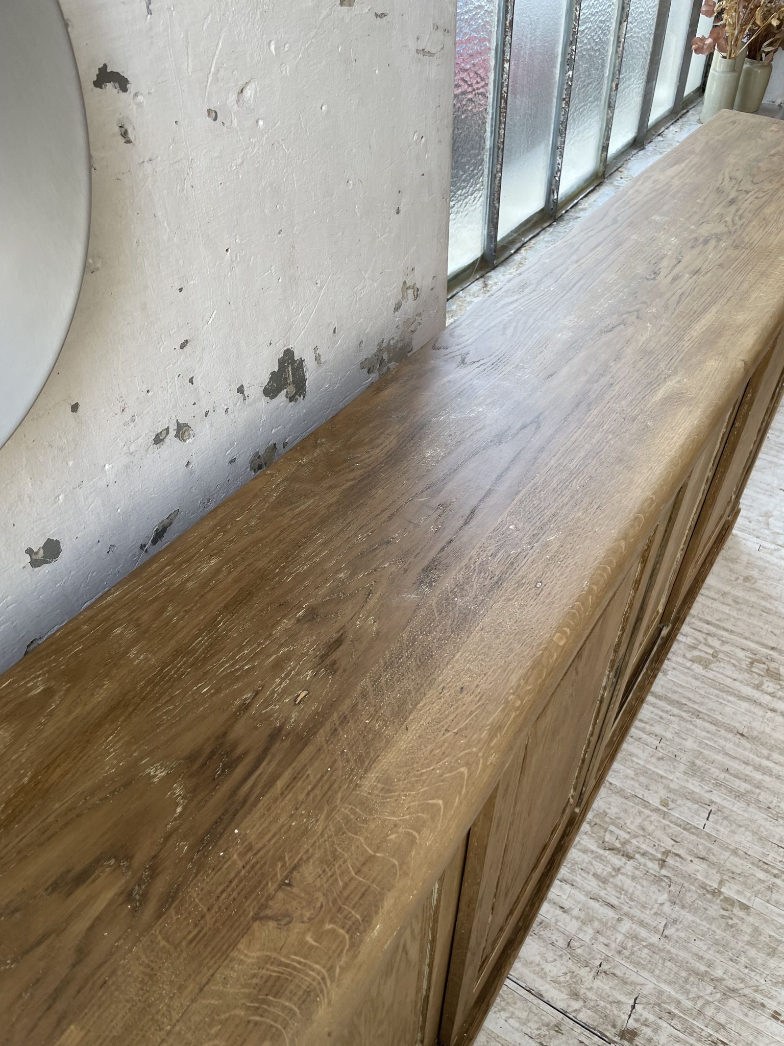 Large row of solid oak loom sliding doors