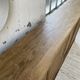 Large row of solid oak loom sliding doors