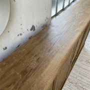 Large row of solid oak loom sliding doors