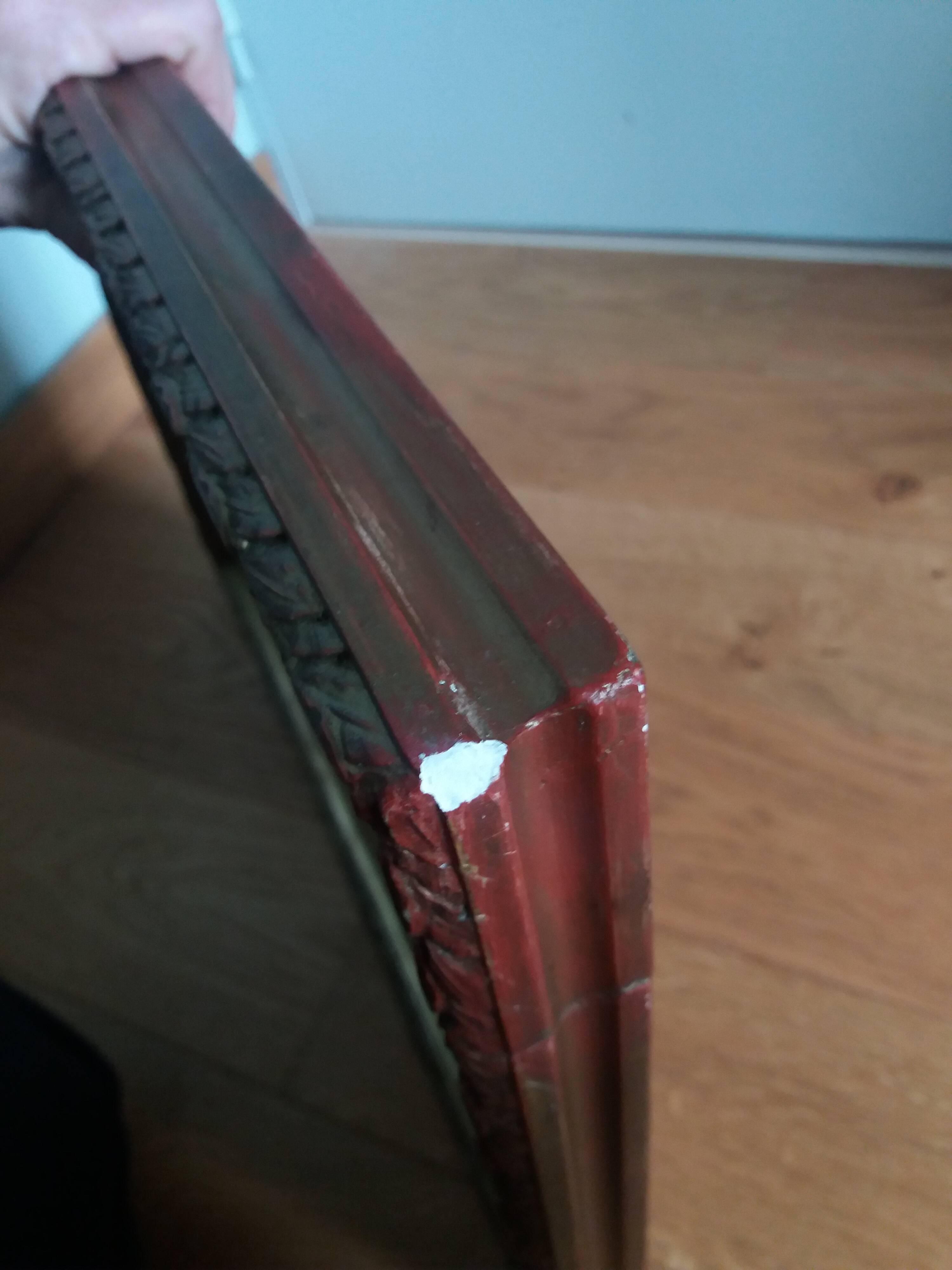 Old photo portrait framed in wood and stucco