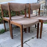 Extendable round dining table and 4 Baumann chairs.