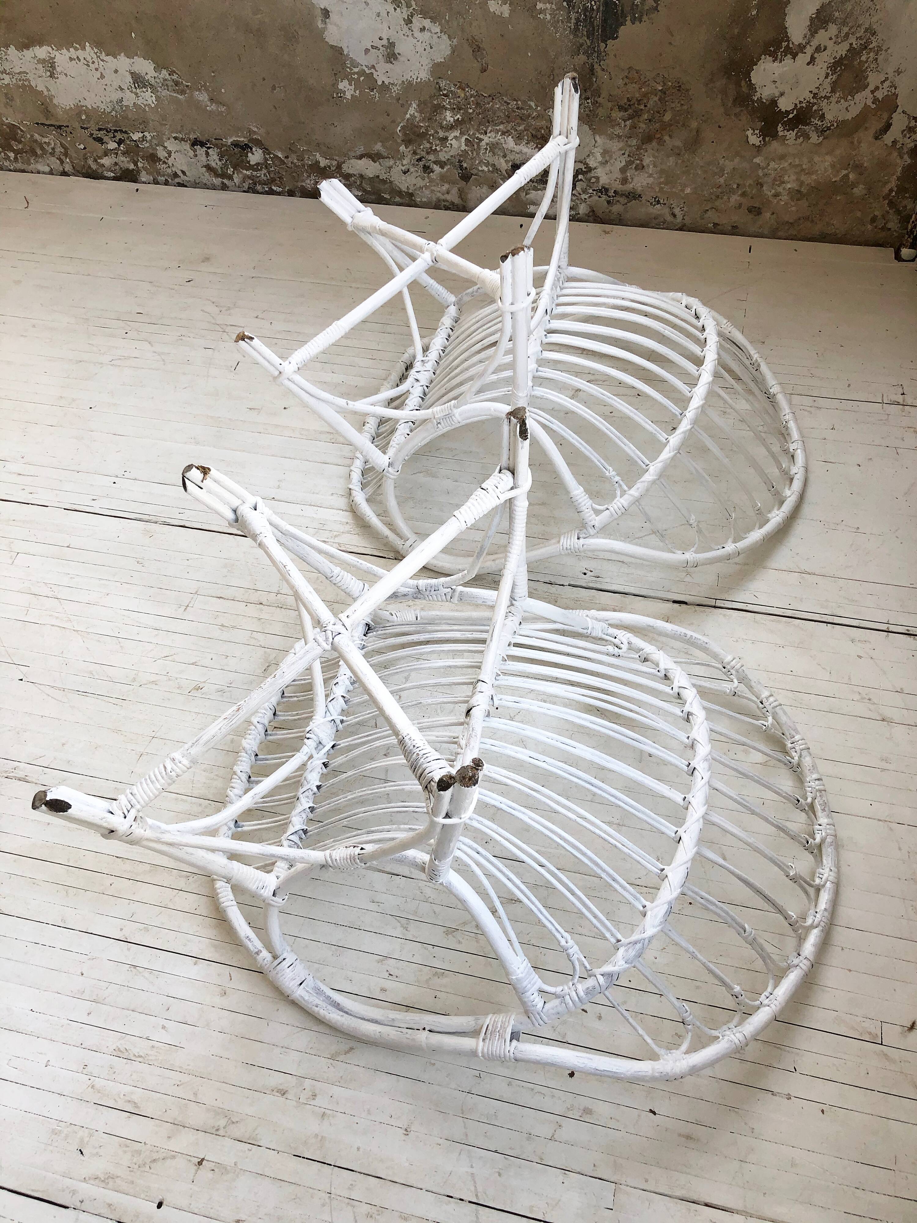 Pair of white rotin armchairs