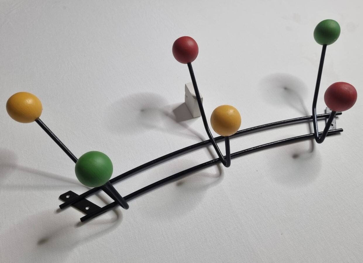 Vintage wall coat rack in black metal and wood, Roger Féraud style from the 1960s.