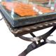 Vintage stone coffee table with a cast iron frame.