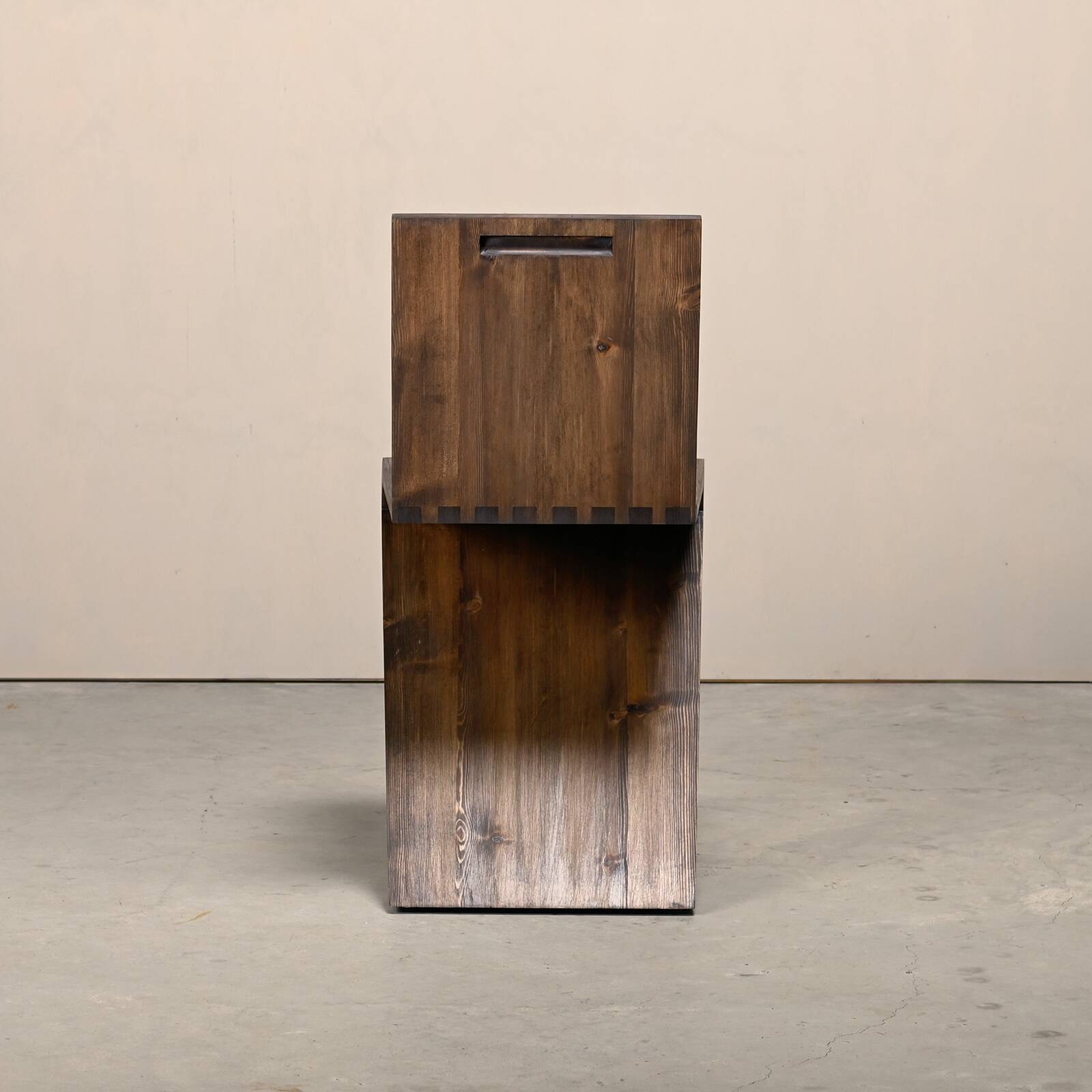 Gerrit Rietveld Zig Zag Chair is dark brown stained wood