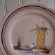 Plate dish with scalloped edges in Nevers earthenware in good condition from the 18th century.