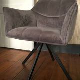 Grey fabric swivel chair in industrial style
