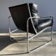 Vintage black leather armchair on metal base, 1980s