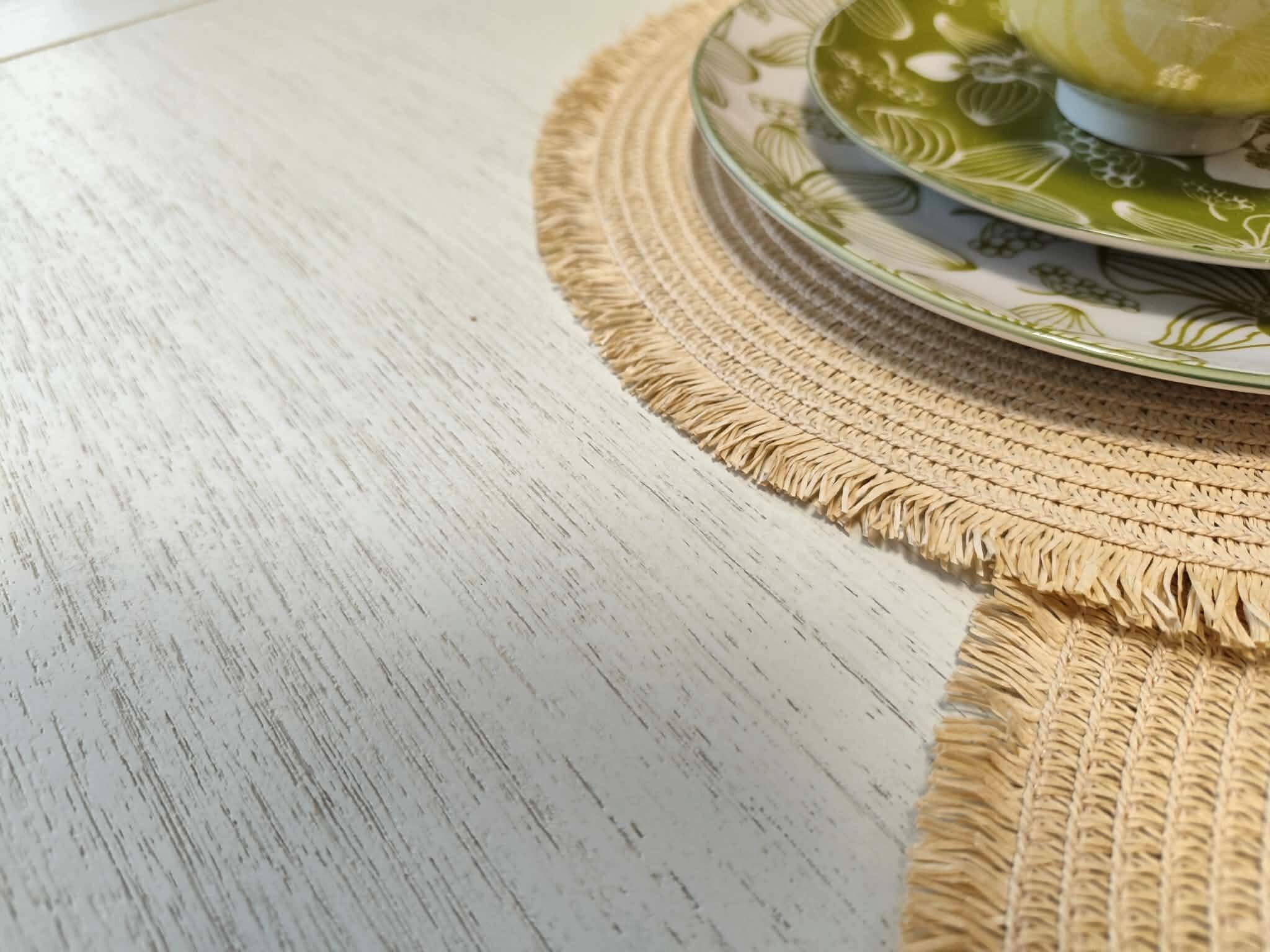 Exotic wood coffee table with its safety glass protection.