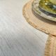 Exotic wood coffee table with its safety glass protection.