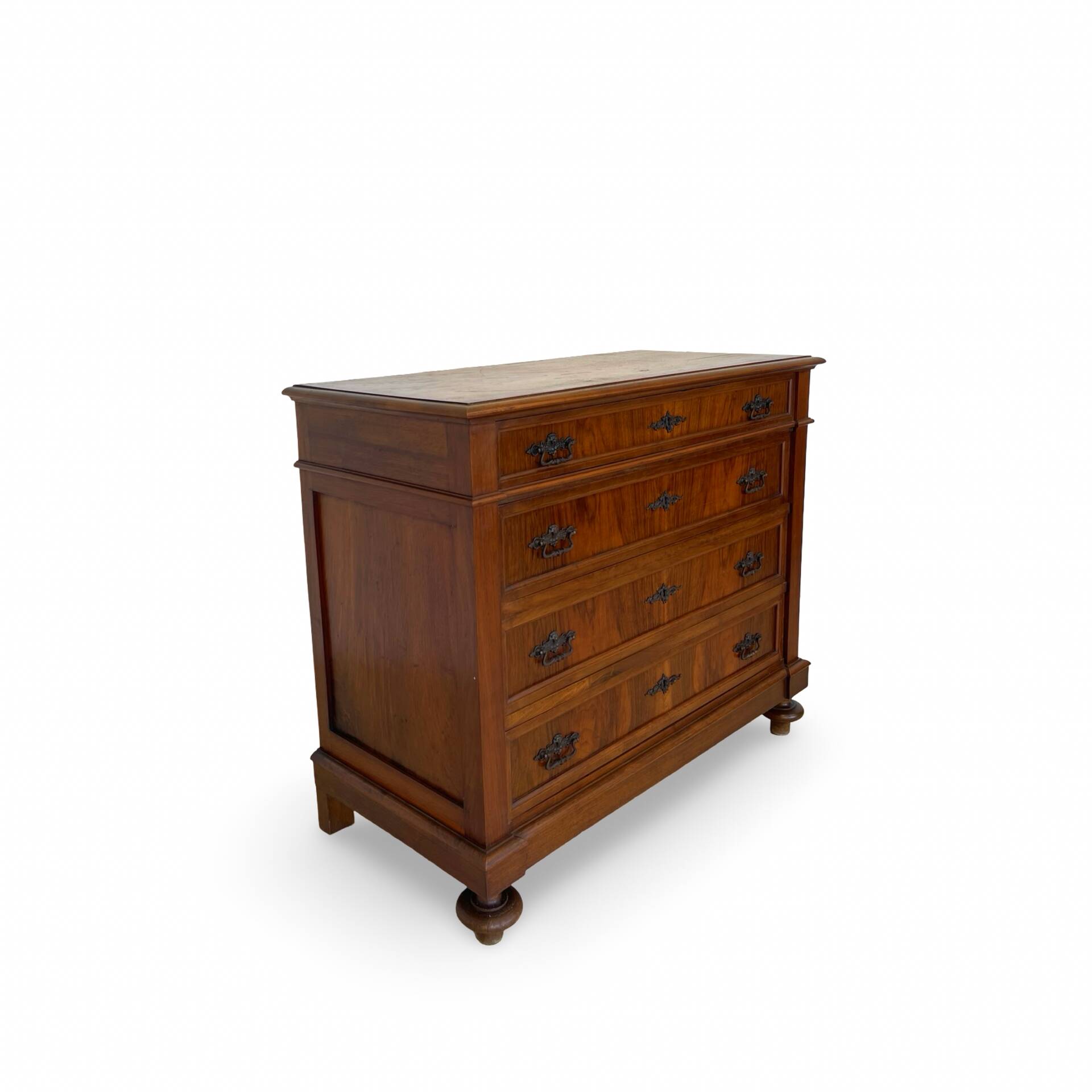 Antique walnut commode with bronze handles in the shape of a lion's mask,