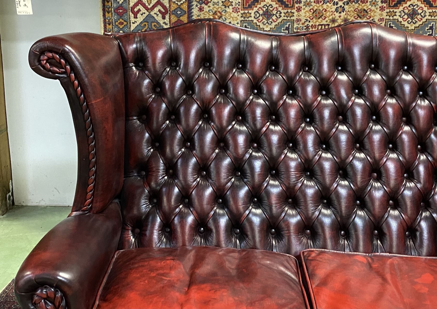 Chesterfield 2-seater leather-eared sofa from the 80s