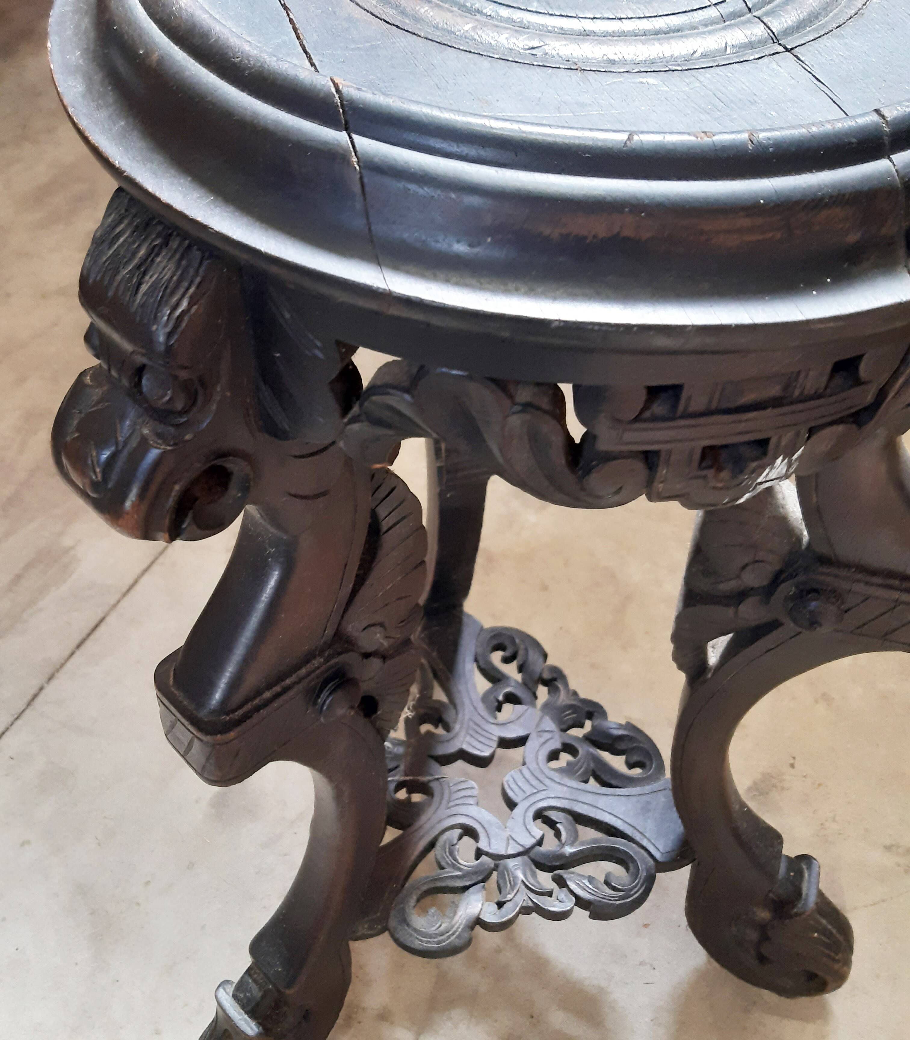 Antique carved side table with Indochinese inspiration, made of blackened wood