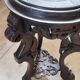 Antique carved side table with Indochinese inspiration, made of blackened wood