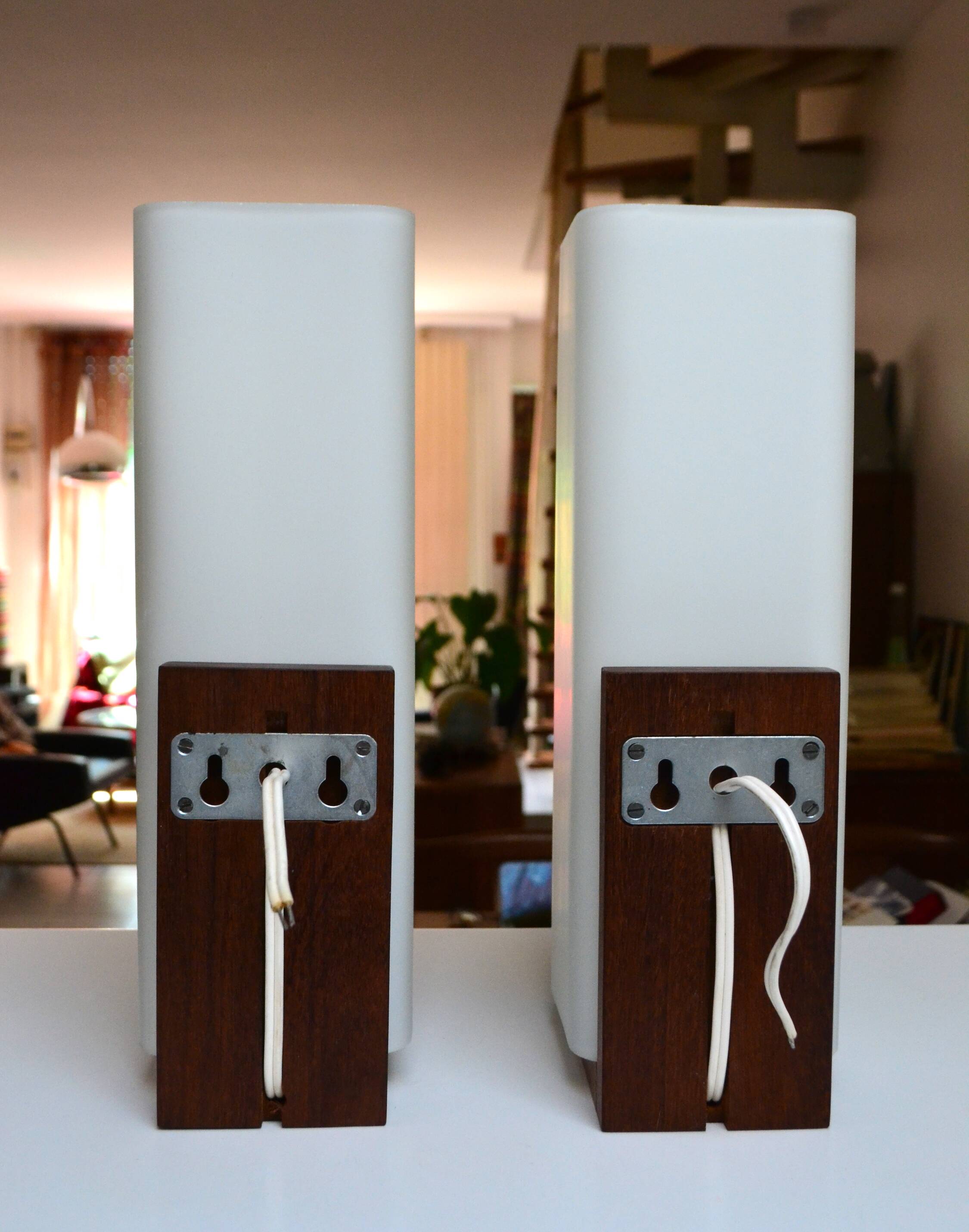 Pair of Louis Kalff wall lights, teak opalines from the 50s/60s.