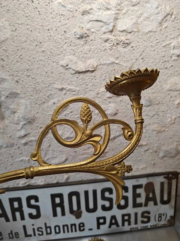 Set of two large antique brass candle wall sconces.