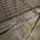 Modular wall bookshelf desk in vintage chrome.