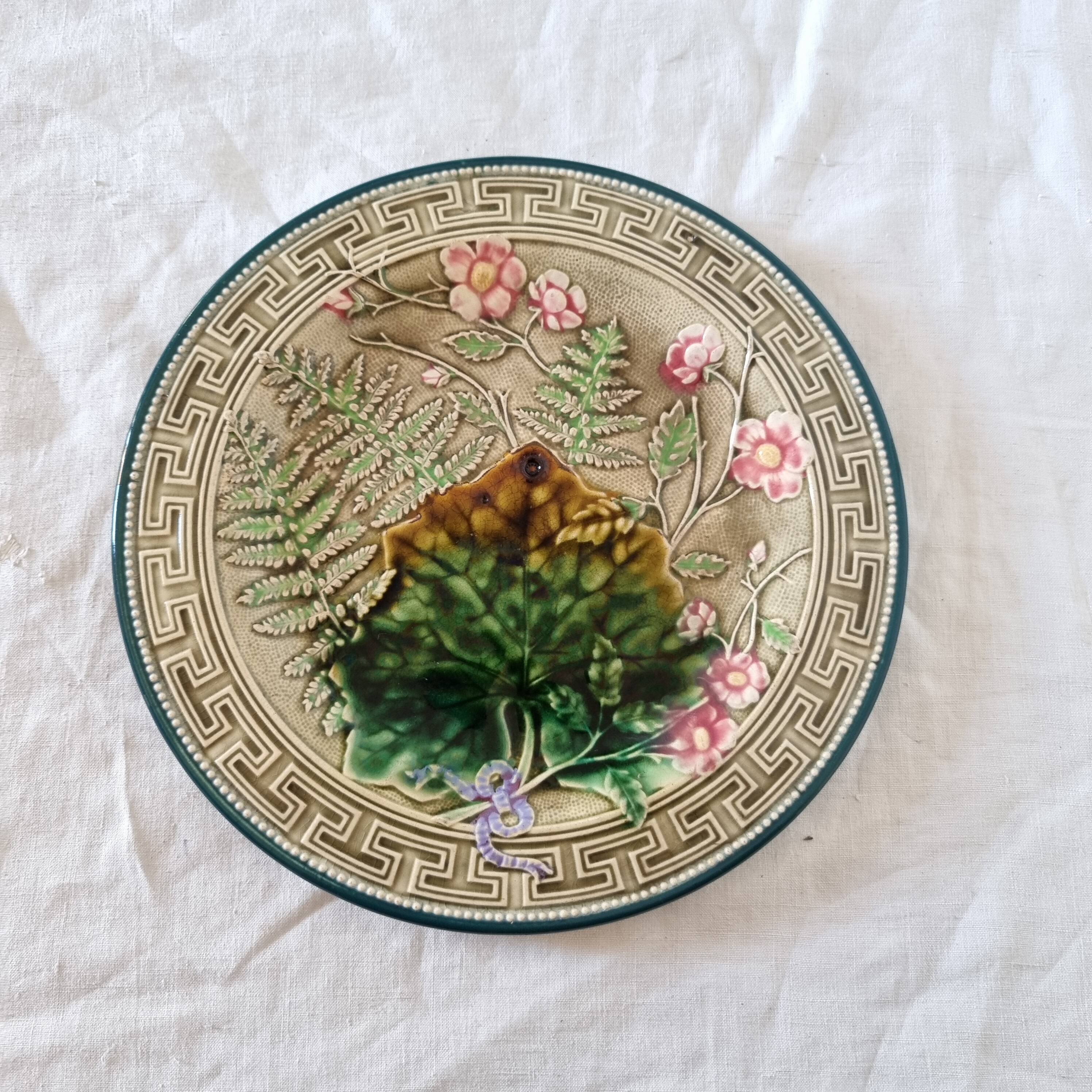 Choisy Le Roi majolica or barbotine dish decorated with leaves and pink flowers from the 19th century