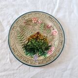 Choisy Le Roi majolica or barbotine dish decorated with leaves and pink flowers from the 19th century