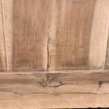 Lit ancien en bois brut