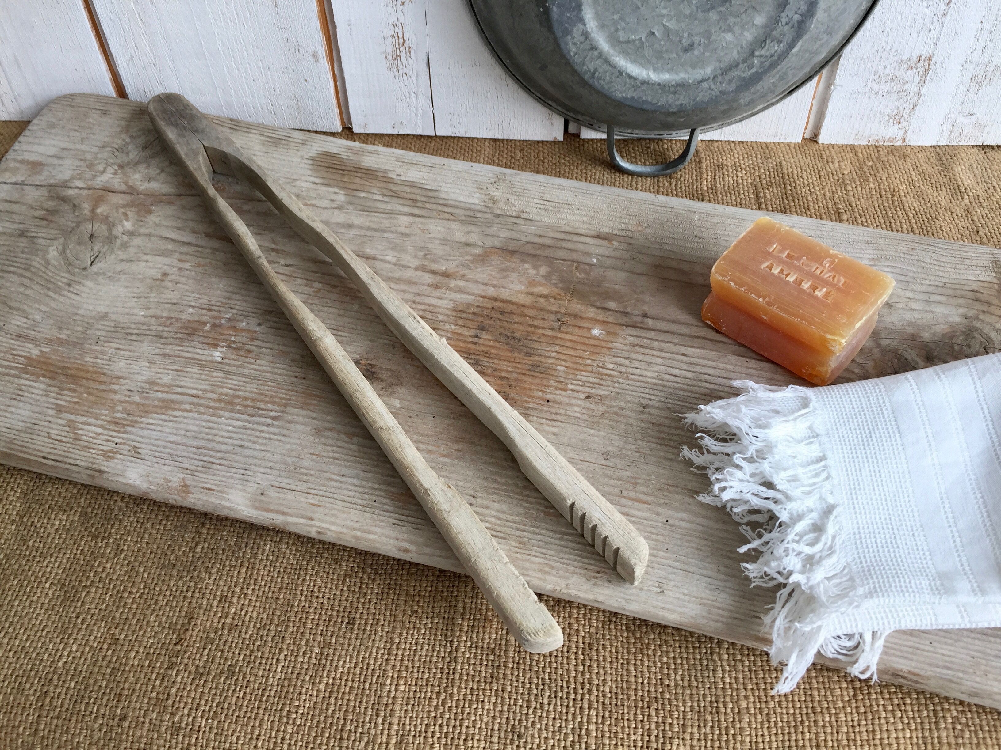 Wooden board with pliers