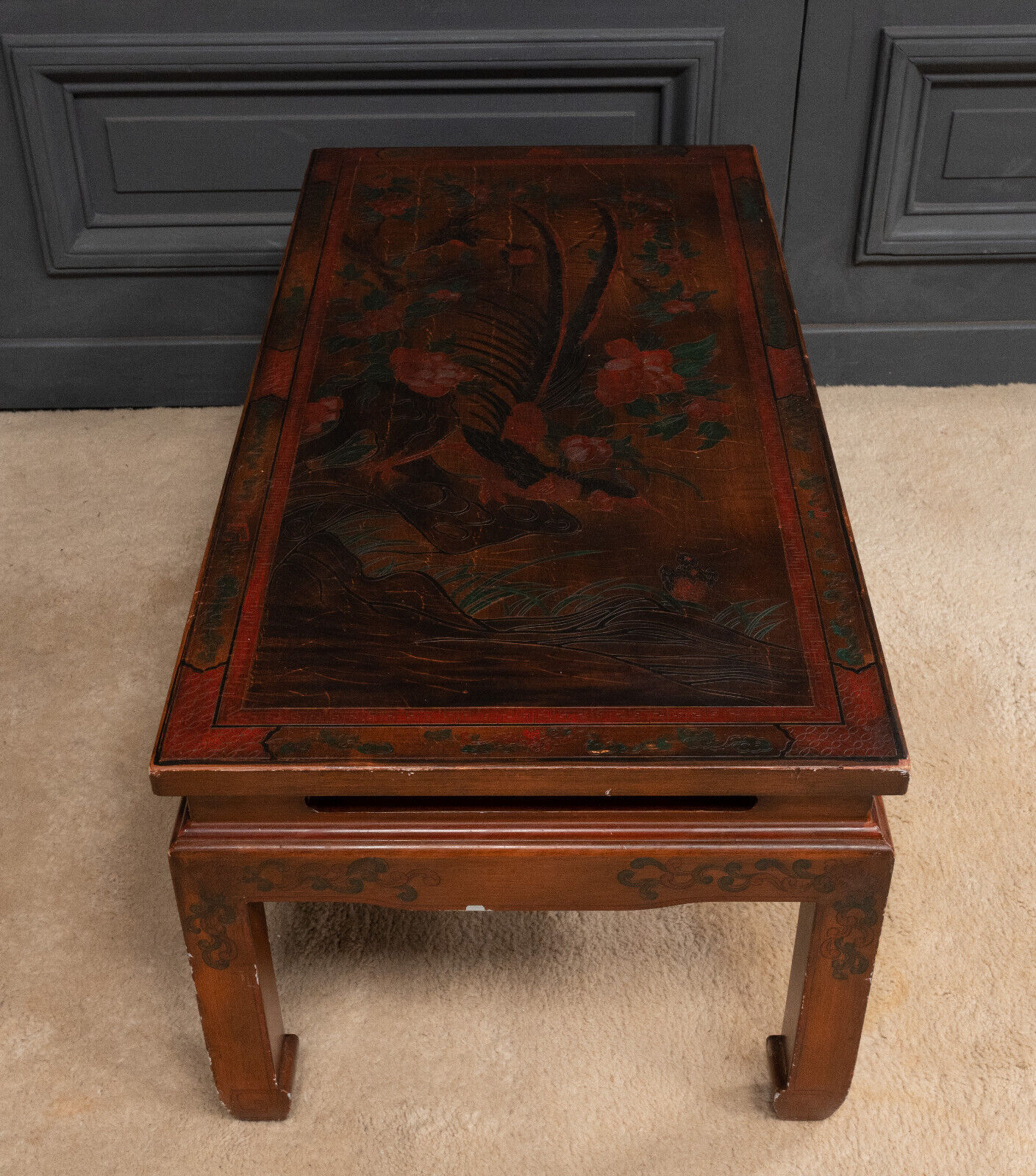 Chinese coffee table lacquer red background naturalistic décor twentieth