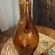 Grand pichet en verre bullé ambré 